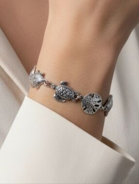 Sea life wrist bracelet Silver Tone Sea Turtle Sand Dollar Fish 7 In. Dolphin